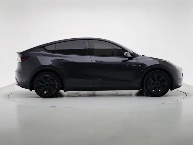Tesla Model Y 2024 — фото 4