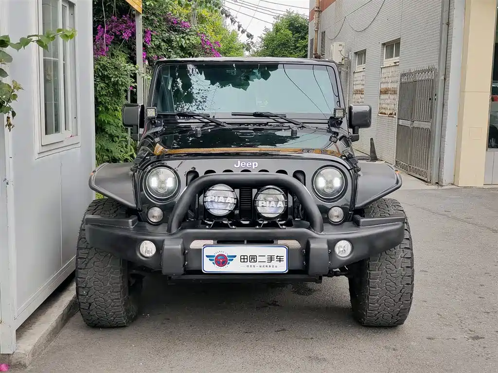 Jeep Wrangler 2015 — фото 2