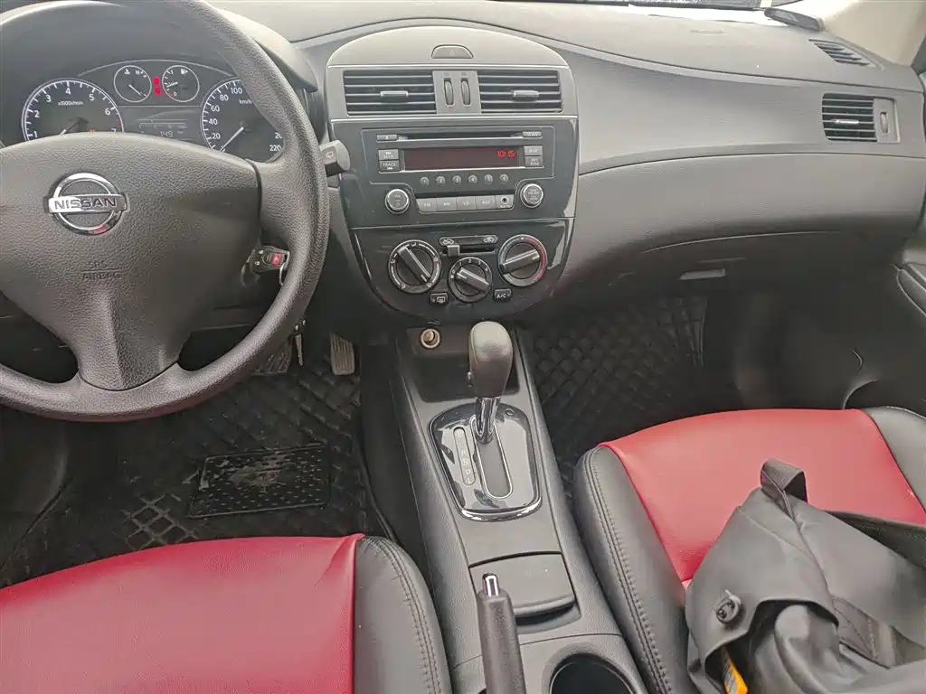 Nissan Tiida 2015 — фото 13