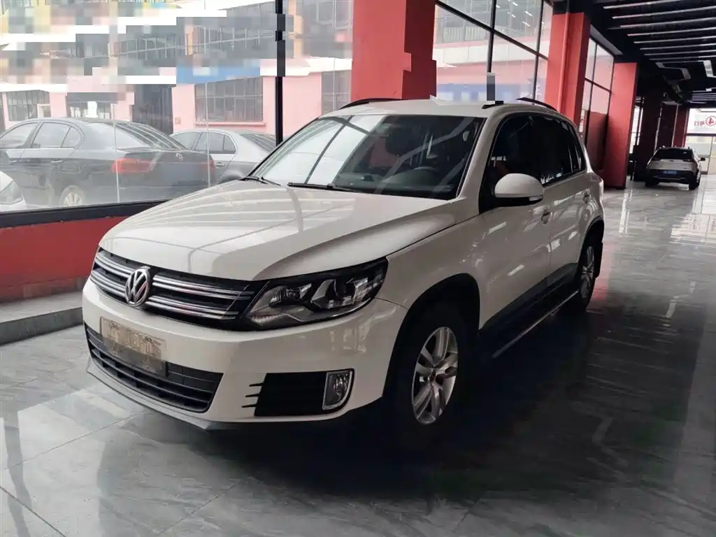 Volkswagen Tiguan 2014 — фото 2