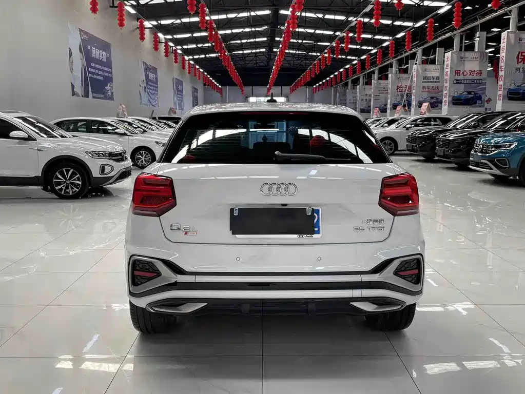 Audi Q2L 2023 — фото 5