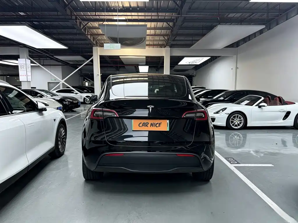 Tesla Model Y 2024 — фото 12