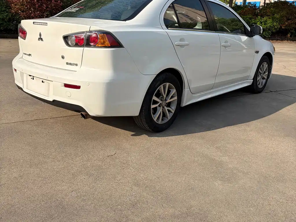 Mitsubishi Lancer EX 2014 — фото 14