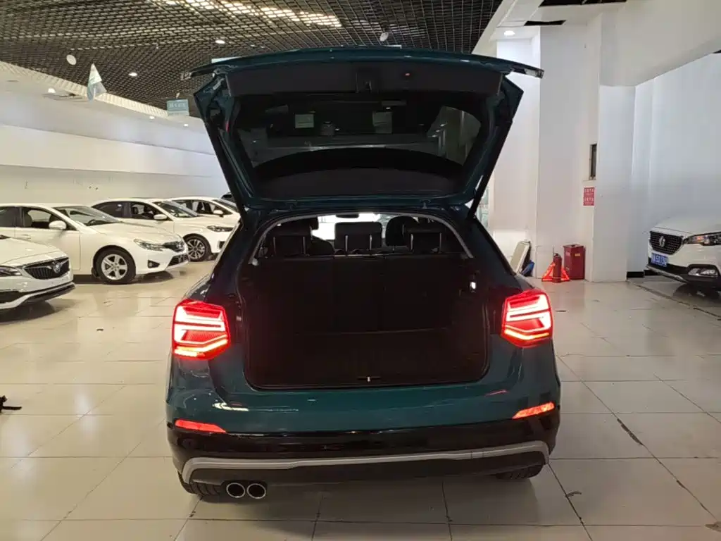 Audi Q2L 2021 — фото 19