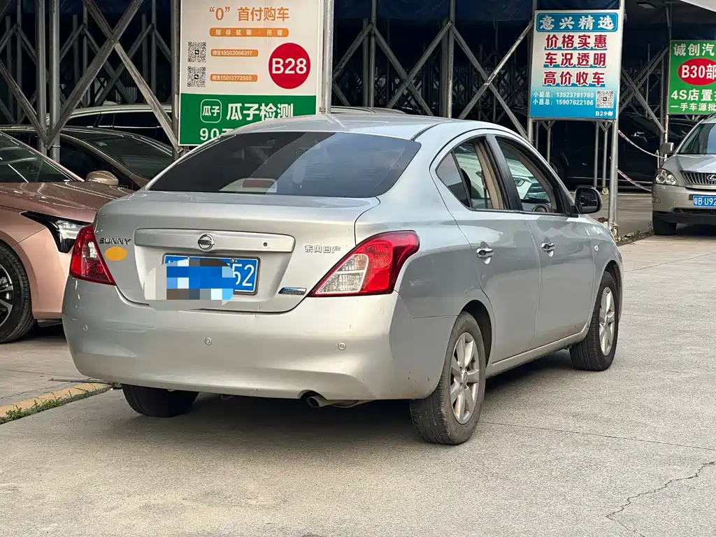 Nissan Sunny 2011 — фото 6
