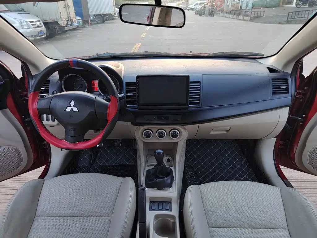 Mitsubishi Lancer EX 2010 — фото 11