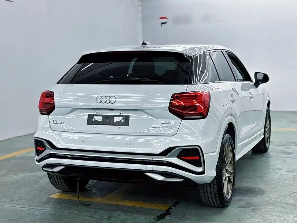 Audi Q2L 2024 — фото 16