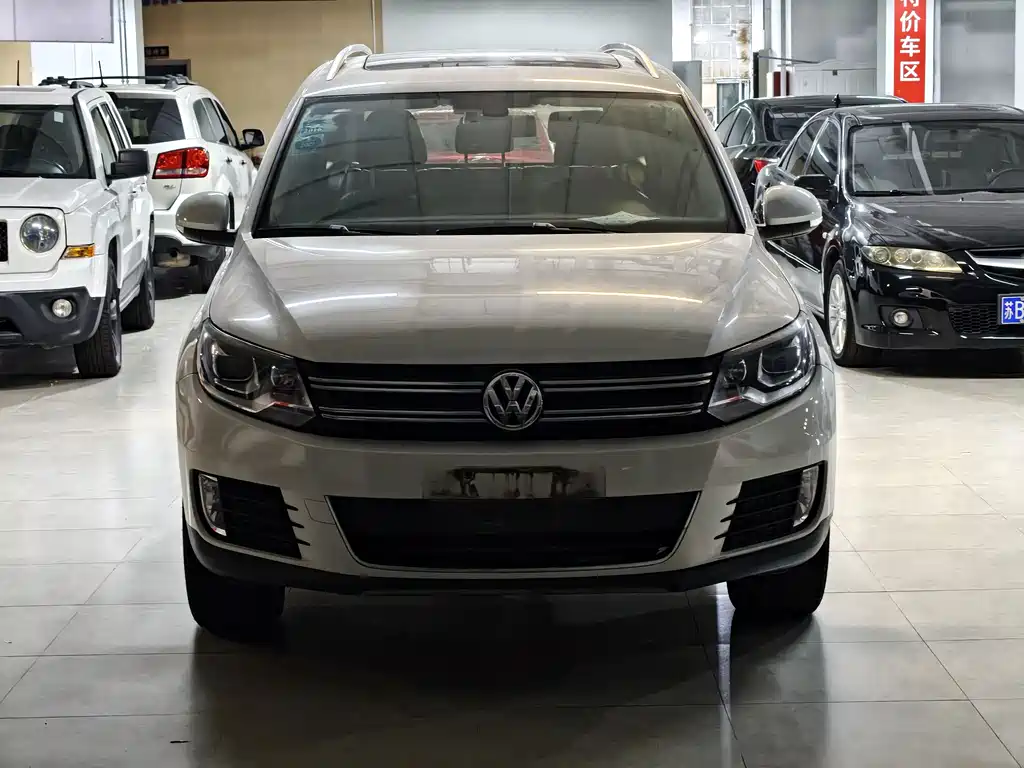 Volkswagen Tiguan 2014 — фото 2