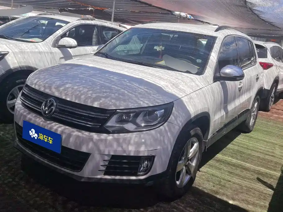 Volkswagen Tiguan 2013 — фото 1