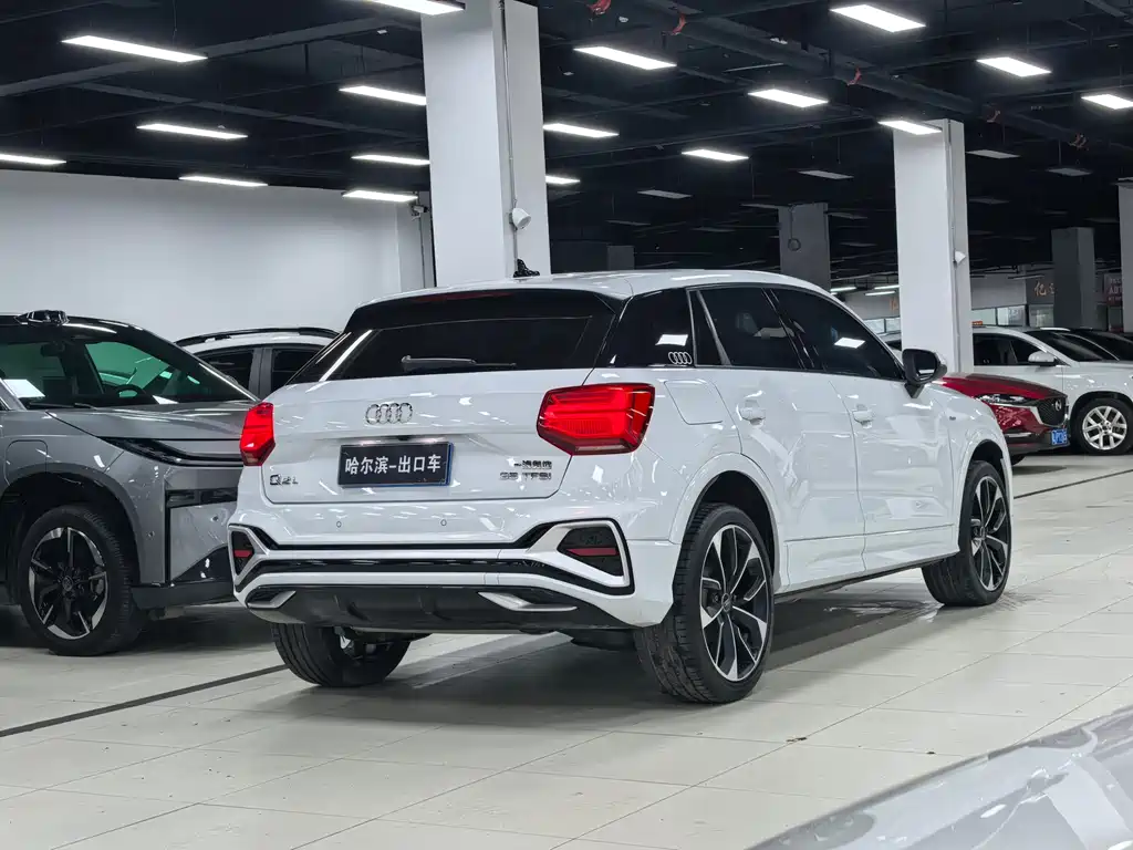 Audi Q2L 2023 — фото 26