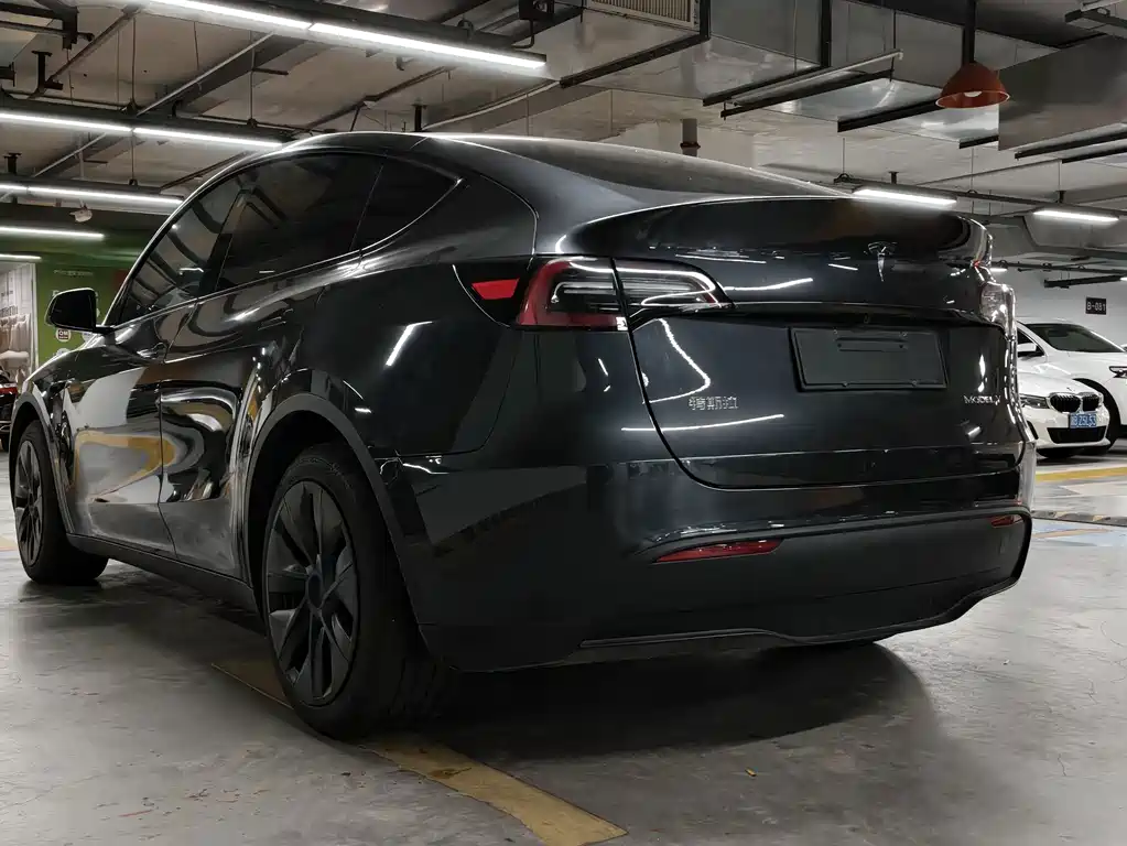 Tesla Model Y 2024 — фото 16