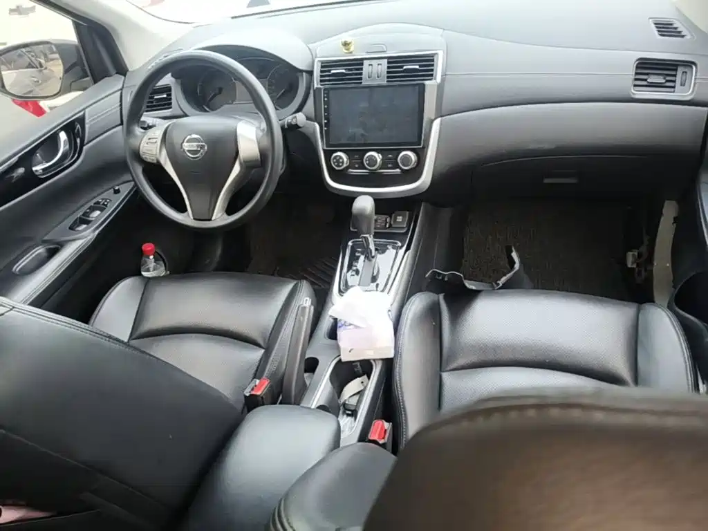 Nissan Tiida 2018 — фото 10