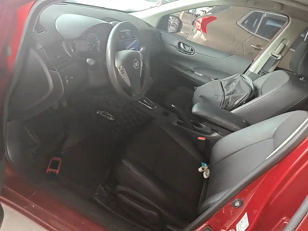 Nissan Tiida 2016 — фото 15