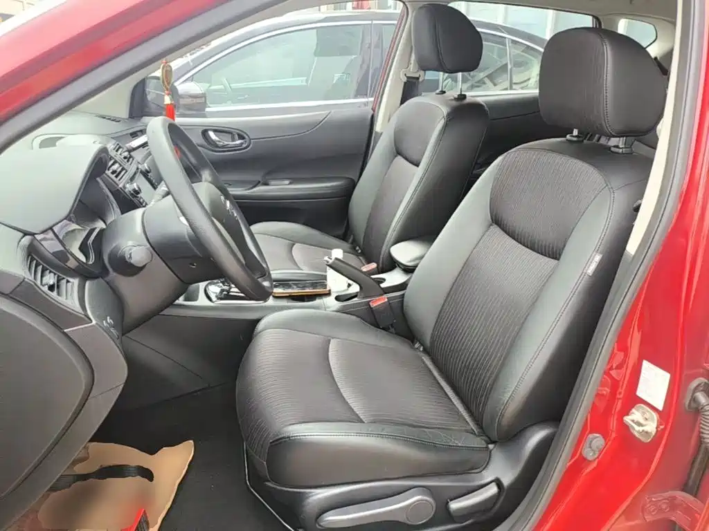 Nissan Tiida 2016 — фото 15