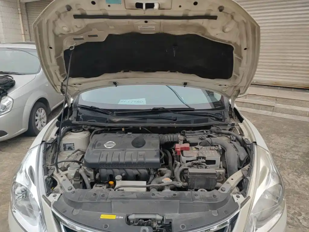 Nissan Tiida 2015 — фото 20
