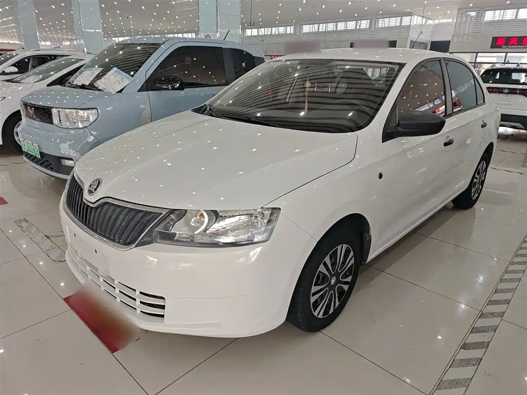 Skoda Rapid 2014 — фото 2