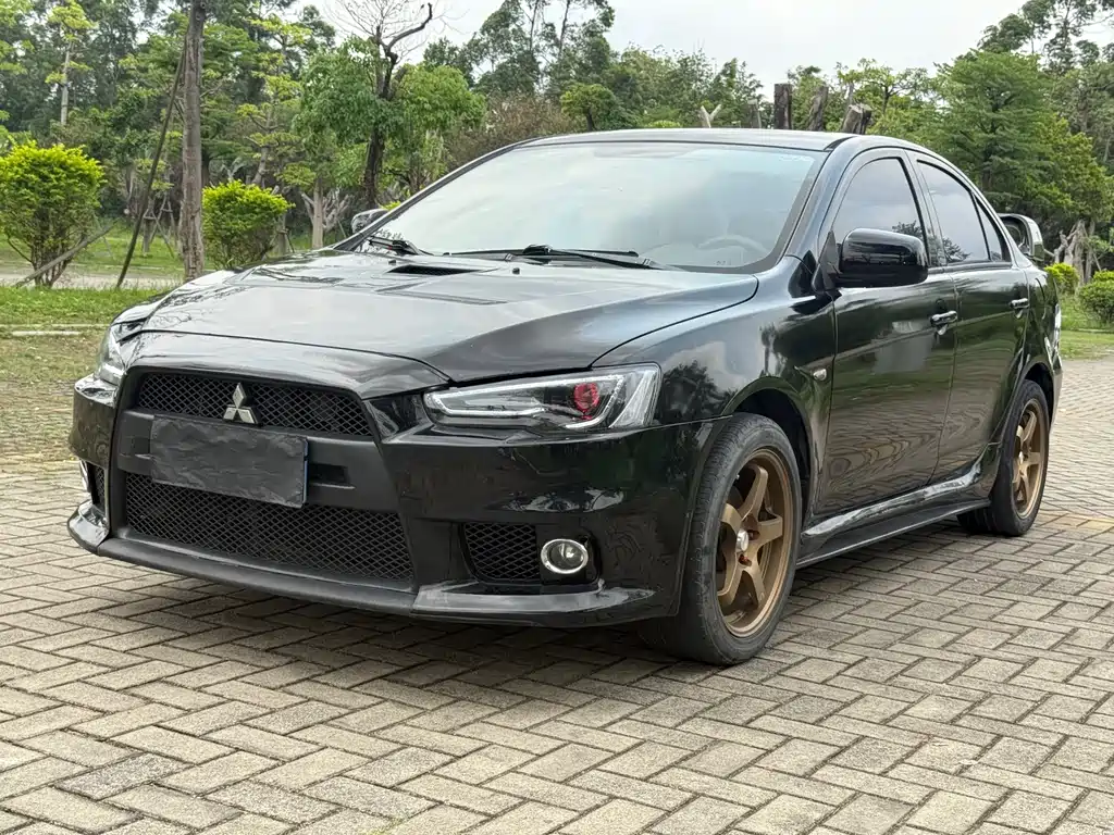 Mitsubishi Lancer EX 2013 — фото 1