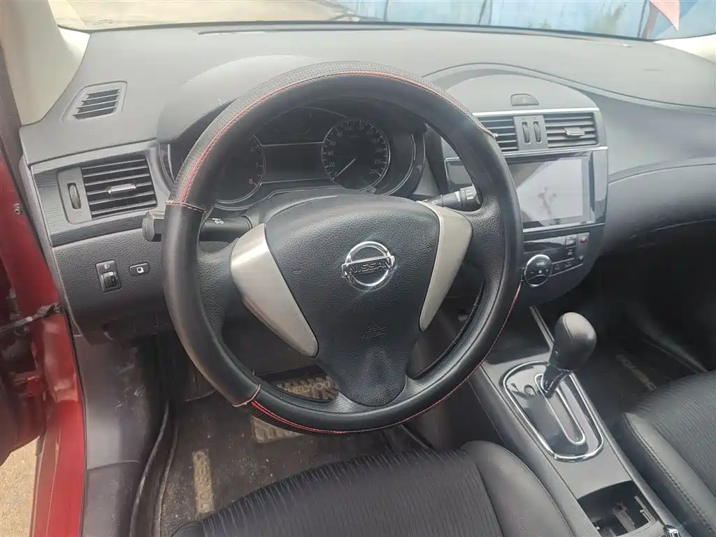 Nissan Tiida 2015 — фото 11
