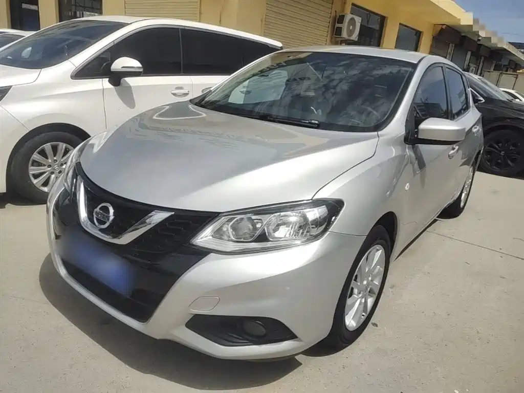 Nissan Tiida 2017 — фото 2