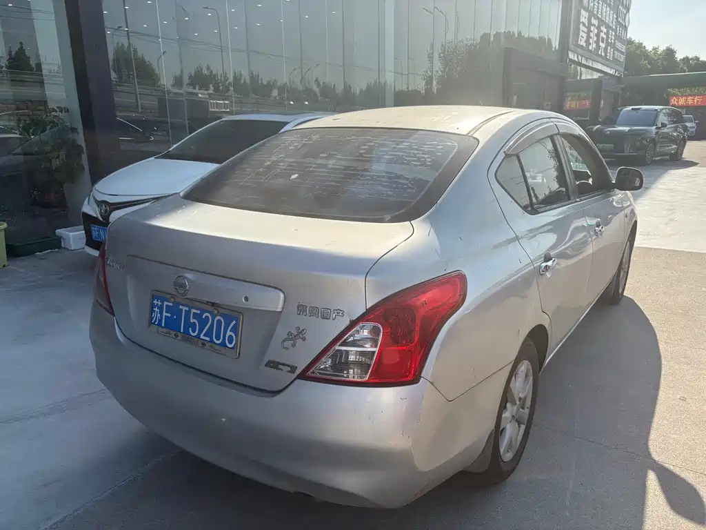 Nissan Sunny 2011 — фото 6