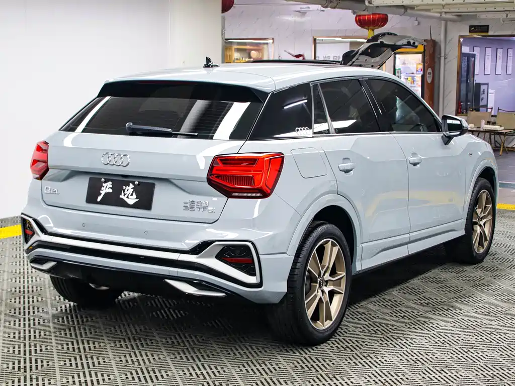 Audi Q2L 2022 — фото 22