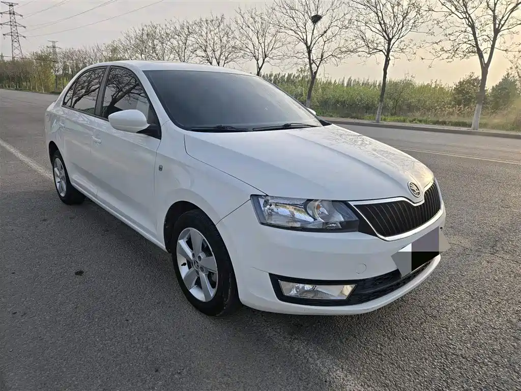 Skoda Rapid 2014 — фото 3