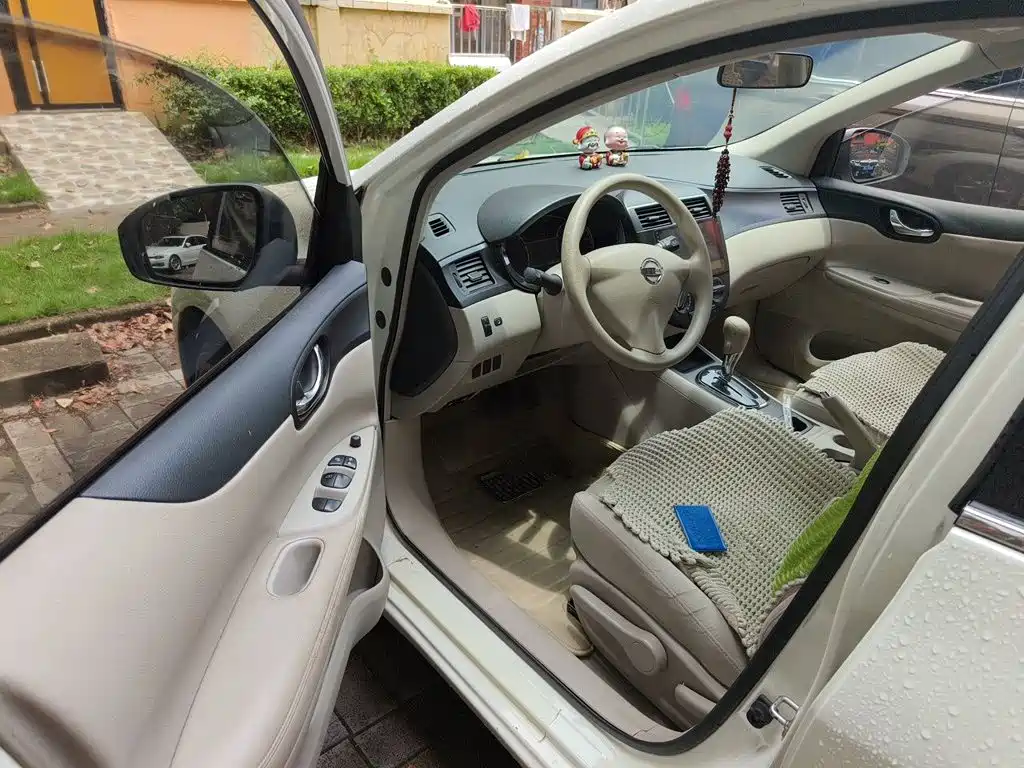 Nissan Tiida 2015 — фото 13