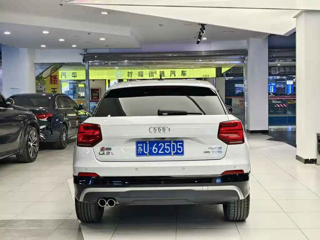 Audi Q2L 2021 — фото 15