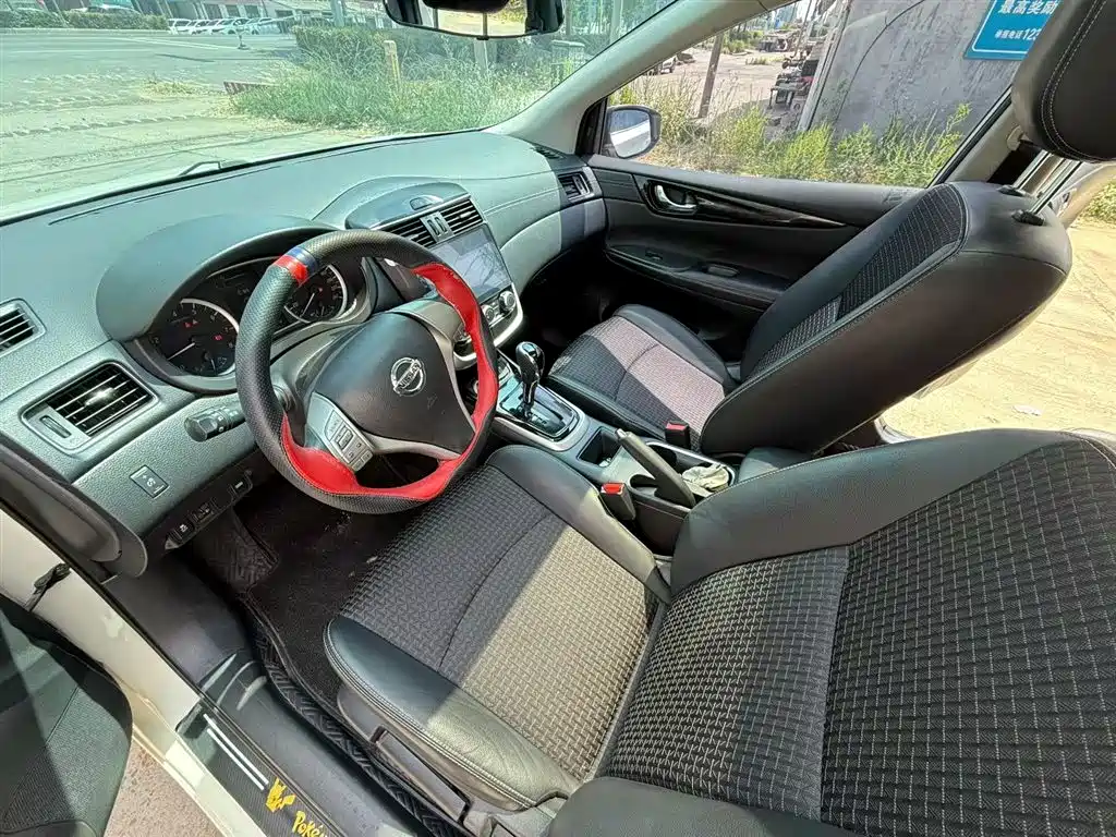 Nissan Tiida 2018 — фото 10