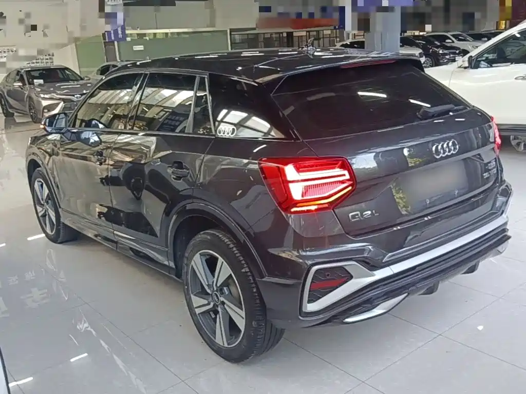 Audi Q2L 2021 — фото 5