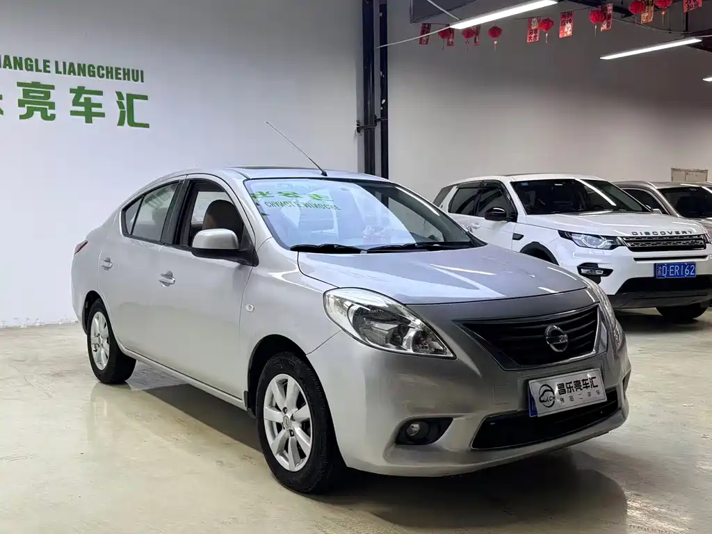 Nissan Sunny 2014 — фото 1