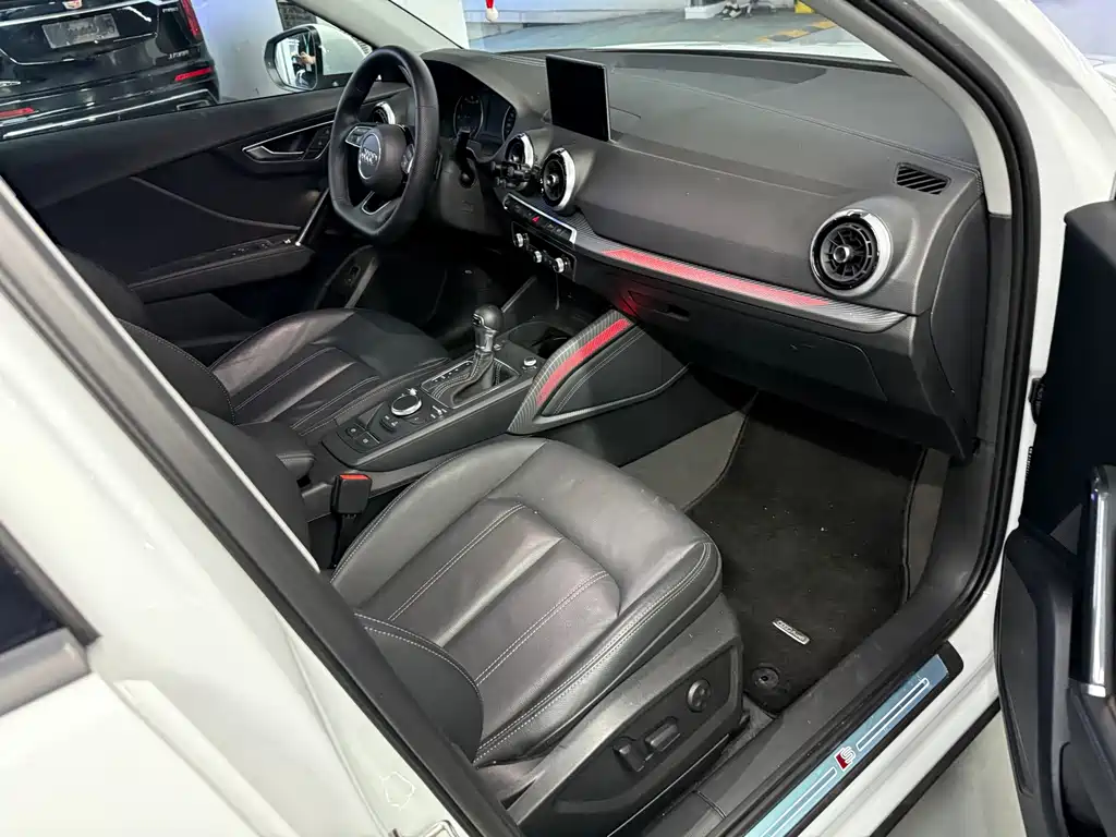 Audi Q2L 2023 — фото 11