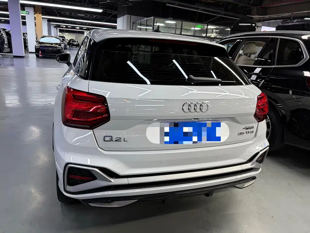 Audi Q2L 2023 — фото 18