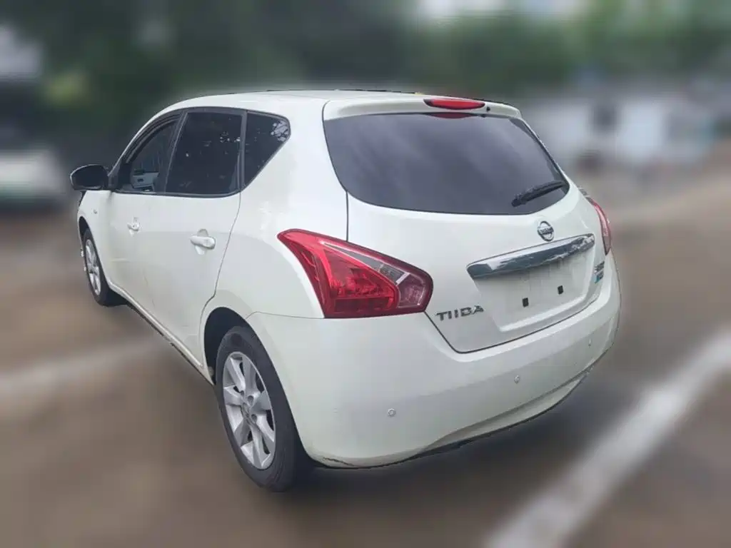 Nissan Tiida 2014 — фото 9