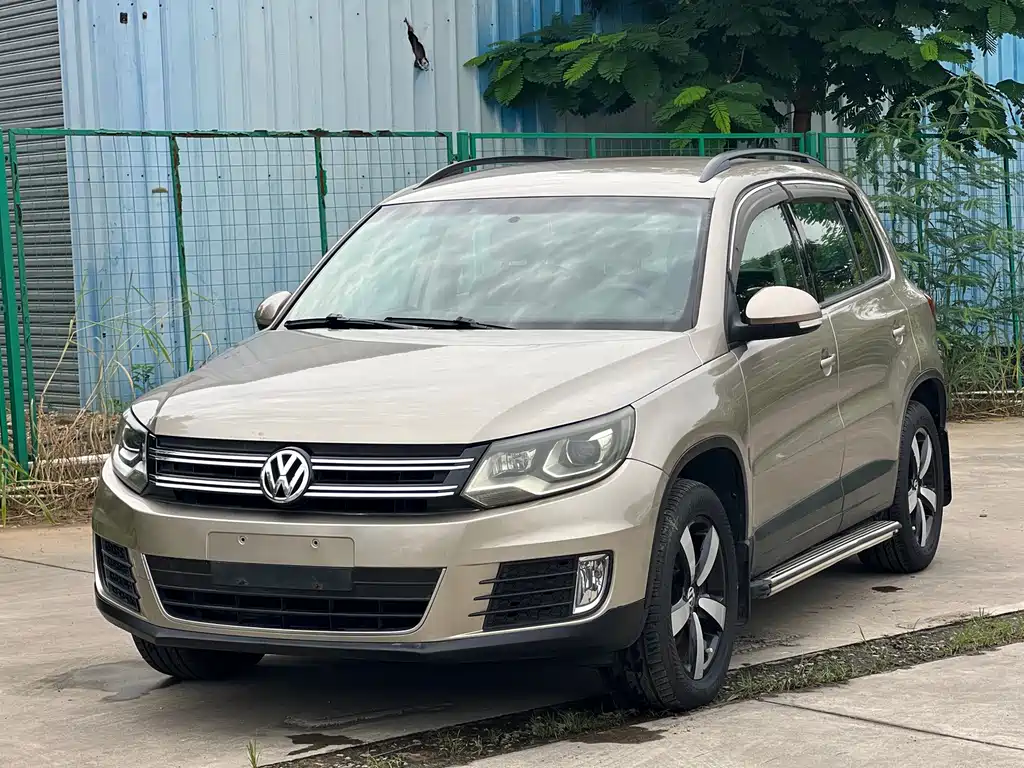 Volkswagen Tiguan 2014 — фото 1