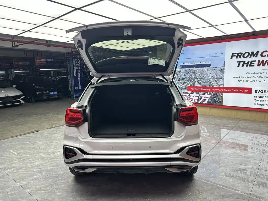 Audi Q2L 2022 — фото 19
