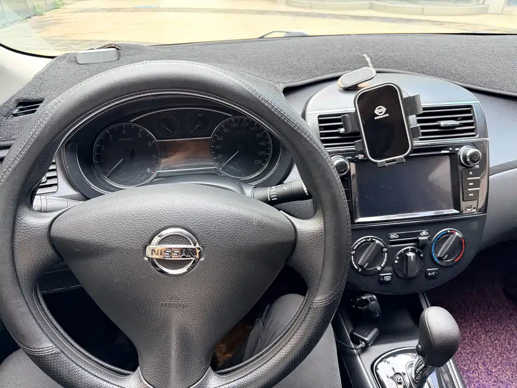 Nissan Tiida 2016 — фото 10