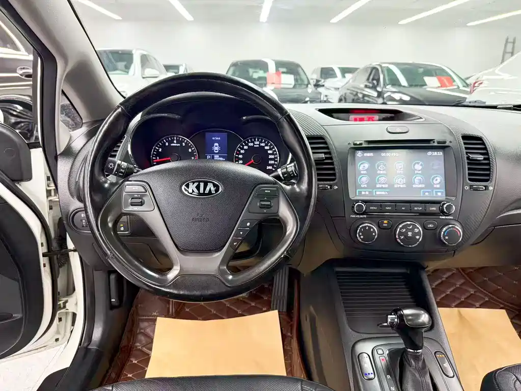 Kia K3 2014 — фото 19