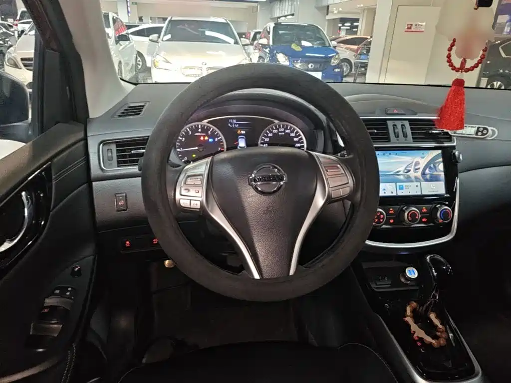 Nissan Tiida 2021 — фото 11