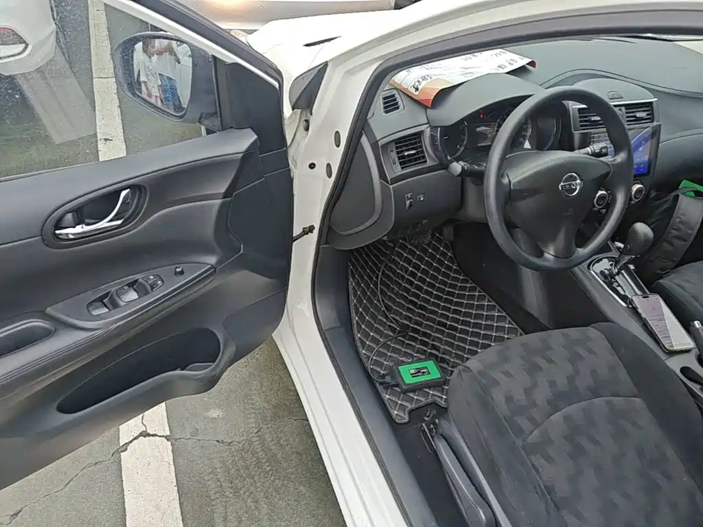 Nissan Tiida 2015 — фото 16
