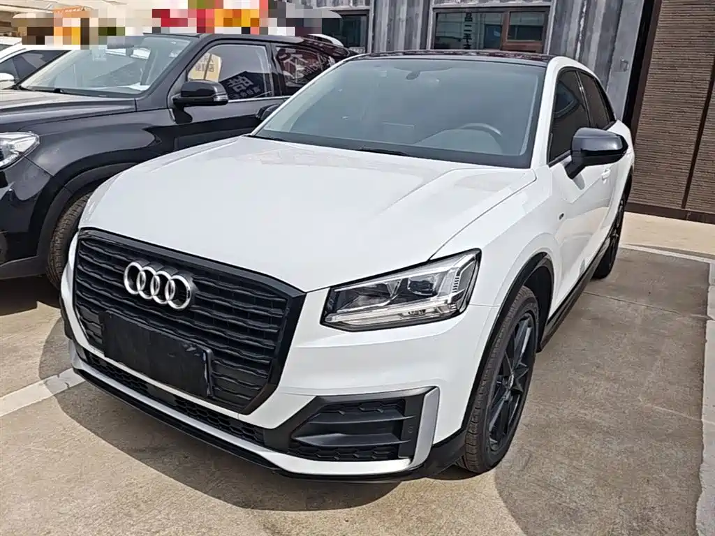 Audi Q2L 2021 — фото 1