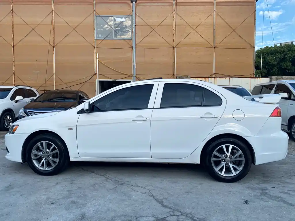 Mitsubishi Lancer EX 2013 — фото 12
