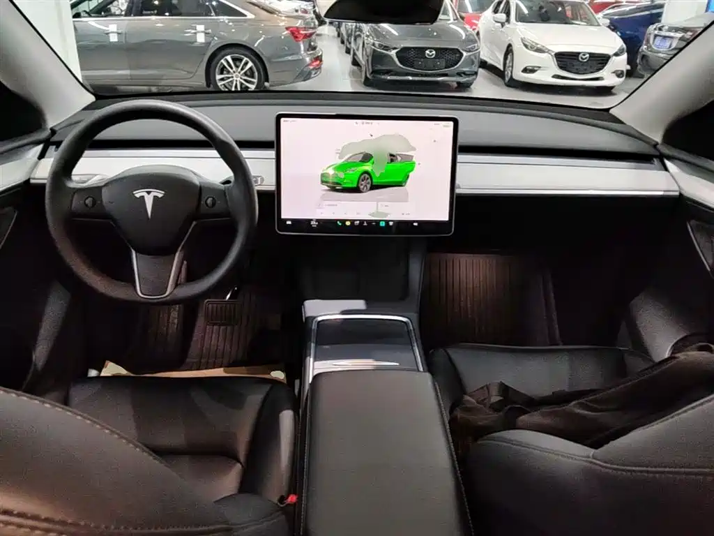 Tesla Model Y 2024 — фото 10