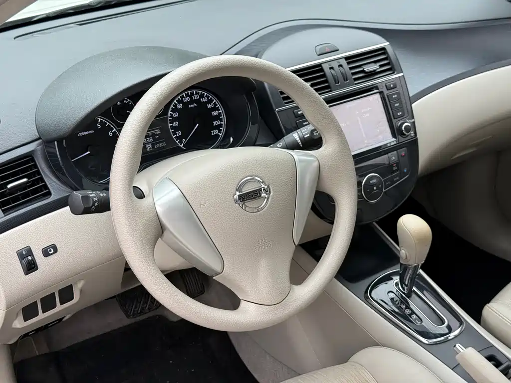 Nissan Tiida 2015 — фото 6