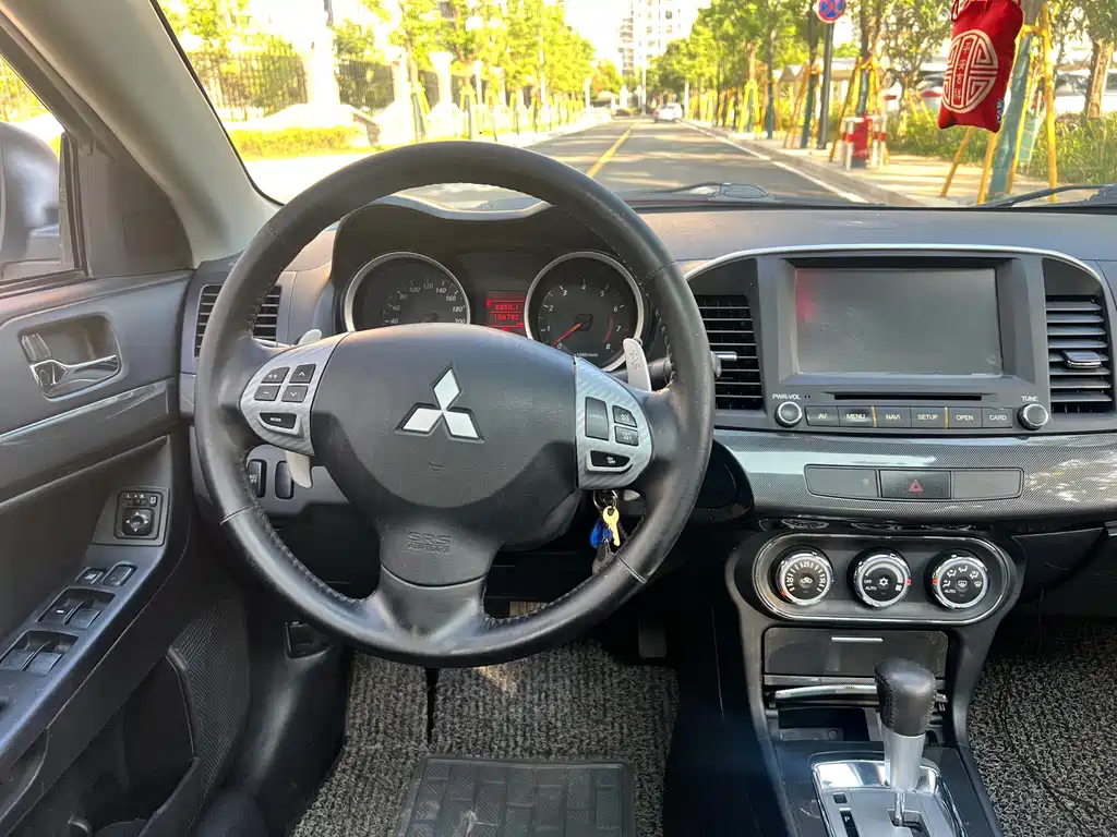 Mitsubishi Lancer EX 2012 — фото 9
