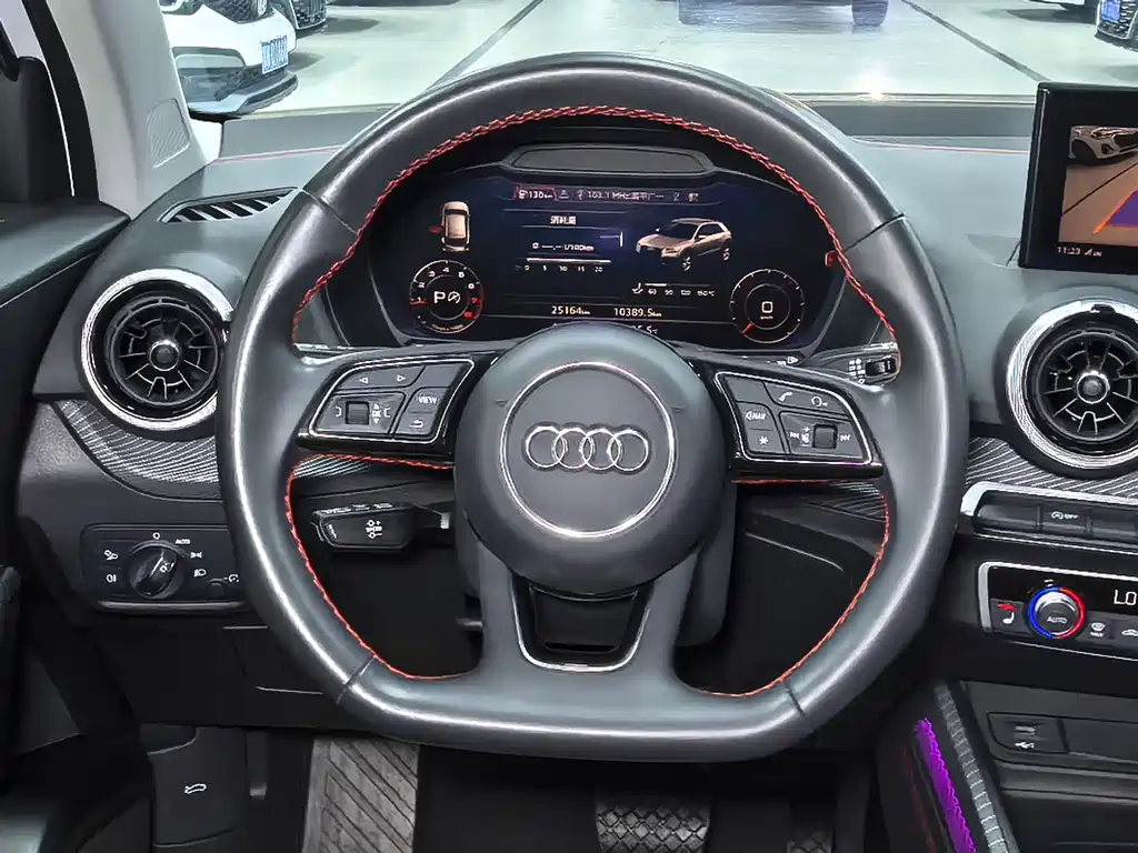 Audi Q2L 2023 — фото 11