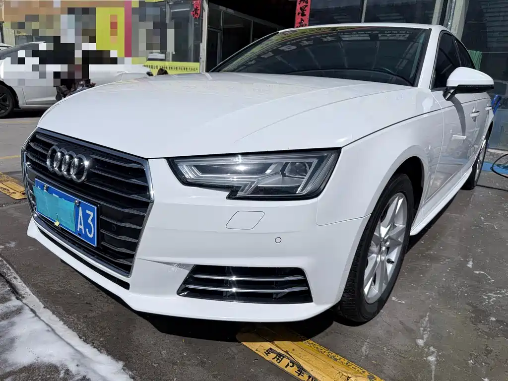 Audi A4L 2018 — фото 1