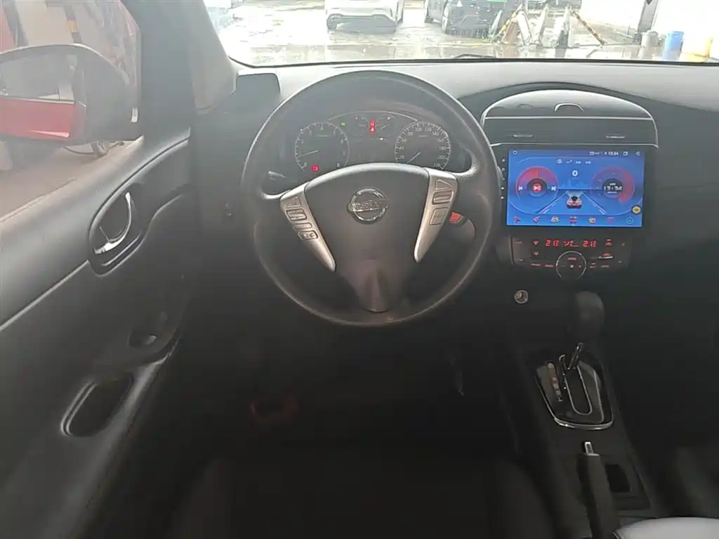 Nissan Tiida 2016 — фото 11