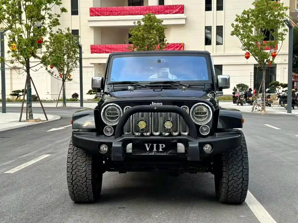 Jeep Wrangler 2014 — фото 2