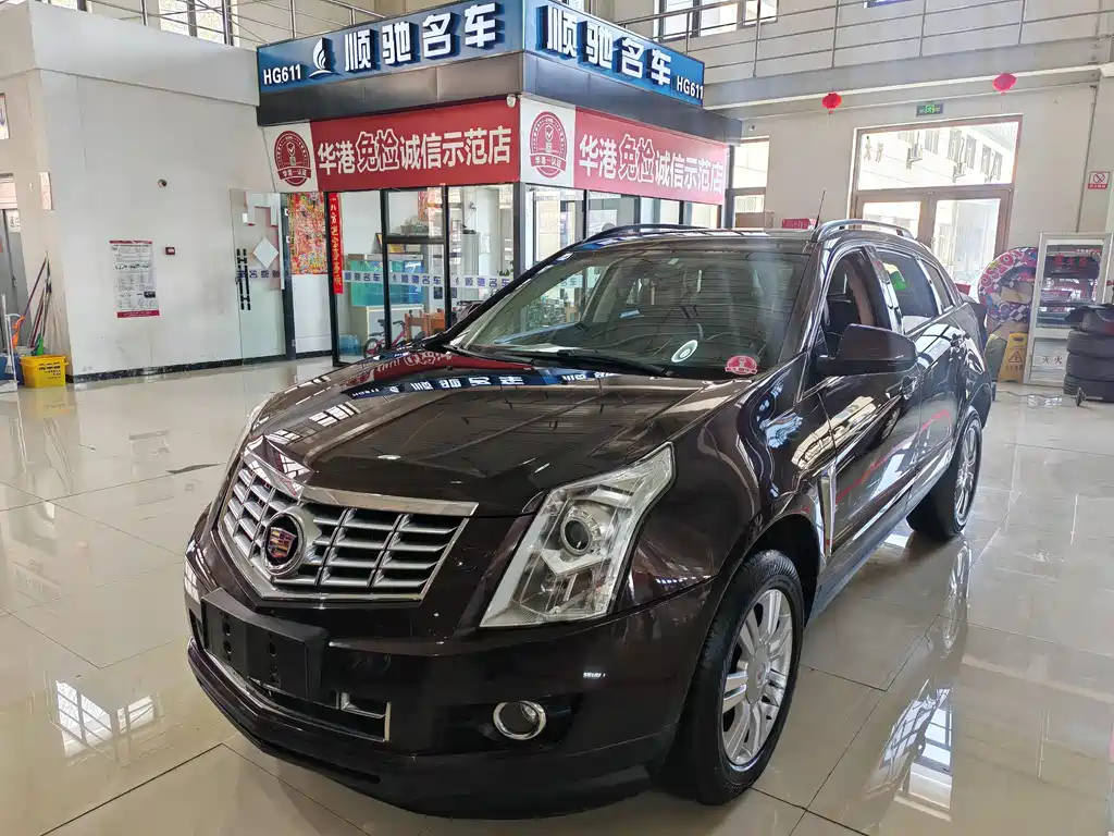 Cadillac SRX 2015 — фото 1